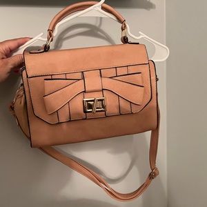 Blush purse with bow